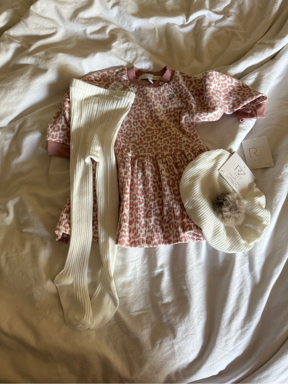 Rachel Zoe Pink Leopard Dress with Cream Tights and Pom Hat